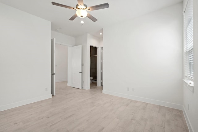 unfurnished bedroom featuring recessed lighting, a closet, baseboards, and light wood-style floors