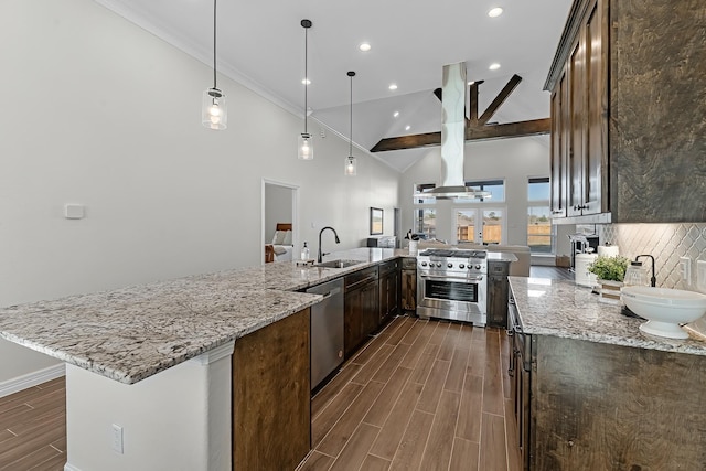 kitchen with light stone countertops, wood finish floors, stainless steel appliances, decorative backsplash, and dark brown cabinets