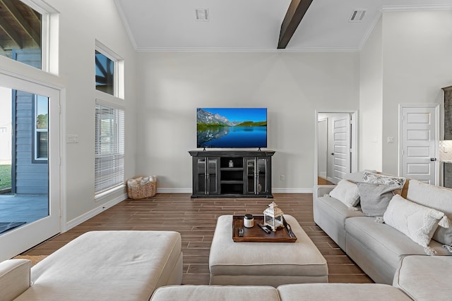 living area with crown molding, a high ceiling, baseboards, and wood tiled floor