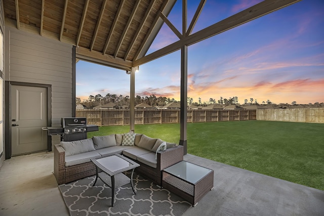 view of patio with grilling area, an outdoor hangout area, and a fenced backyard