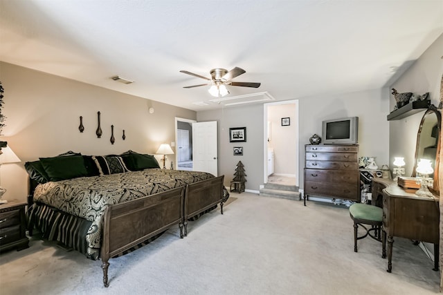 bedroom featuring visible vents, a ceiling fan, and carpet