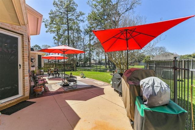 view of patio / terrace featuring outdoor dining area and a fenced backyard