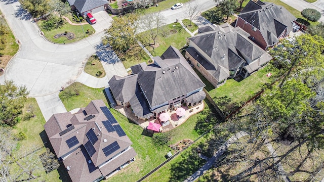 birds eye view of property with a residential view