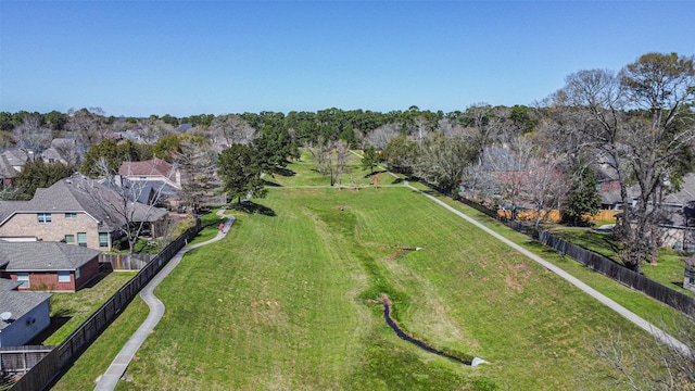 birds eye view of property with a residential view