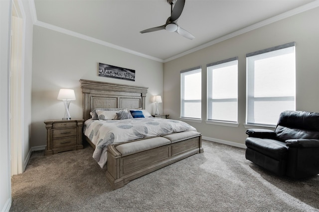 carpeted bedroom featuring ceiling fan, crown molding, and baseboards