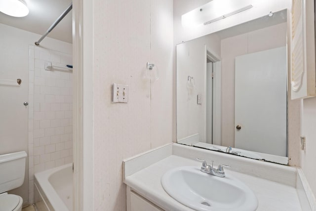 full bathroom with vanity, bathing tub / shower combination, and toilet