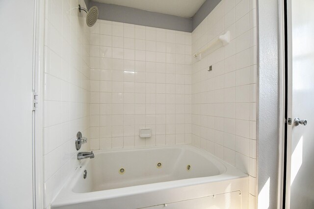 full bathroom with a combined bath / shower with jetted tub