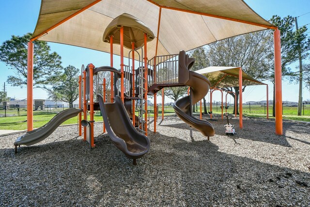 community jungle gym with fence