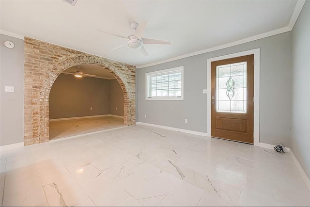 3126 Mierianne St, Houston, TX 77093 - foyer with ceiling fan, crown molding, marble finish floor, and arched walkways