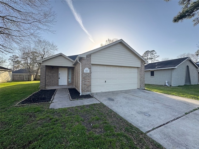 single story home with brick siding, an attached garage, concrete driveway, and a front yard