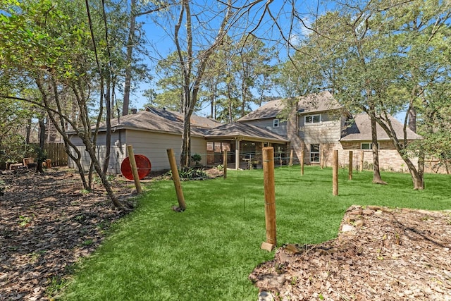 view of yard with fence