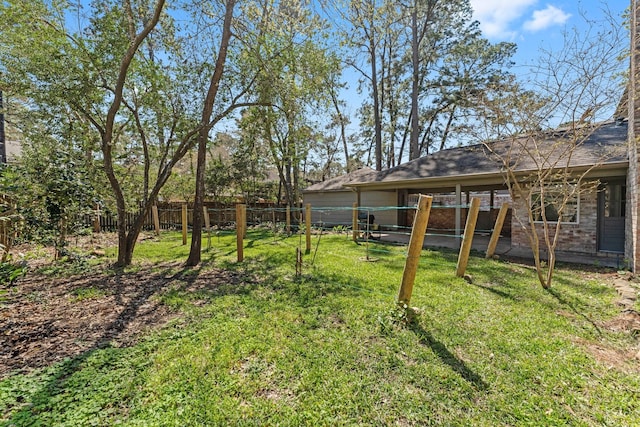 view of yard featuring fence