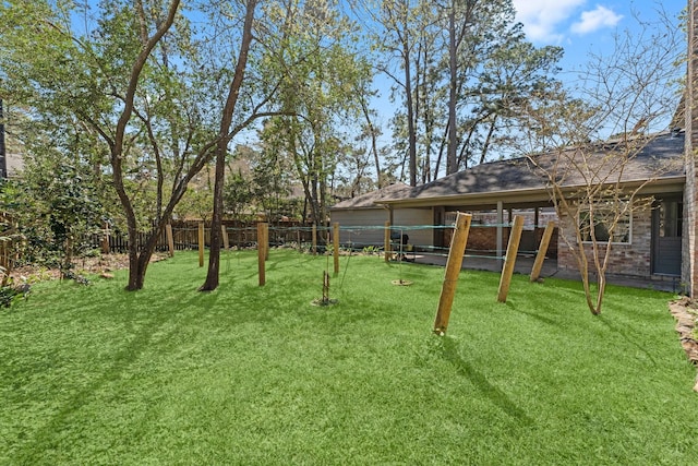 view of yard featuring fence