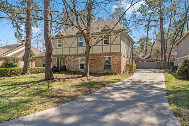 view of property exterior with stucco siding, a garage, central air condition unit, a lawn, and brick siding