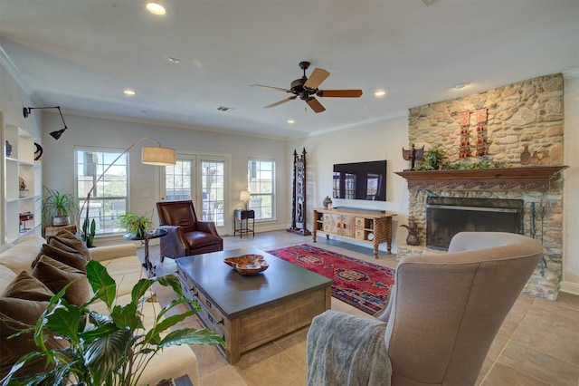 359 Cambridge Dr, New Braunfels, TX 78132 - living area with a fireplace, a ceiling fan, ornamental molding, and recessed lighting