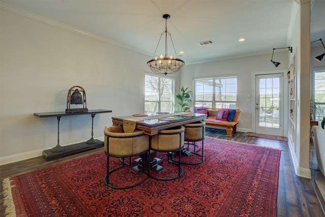 359 Cambridge Dr, New Braunfels, TX 78132 - dining area with visible vents, baseboards, ornamental molding, and an inviting chandelier