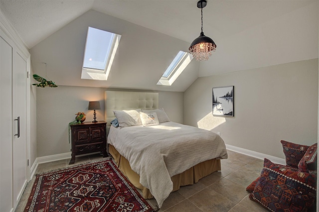 359 Cambridge Dr, New Braunfels, TX 78132 - bedroom featuring vaulted ceiling with skylight, tile patterned flooring, and baseboards