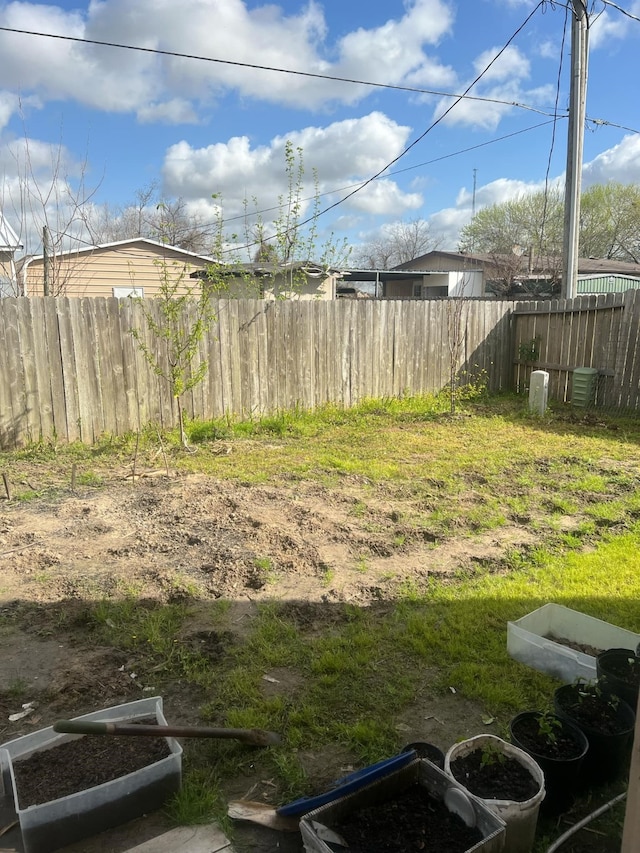 view of yard featuring fence