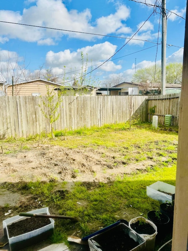 view of yard featuring fence