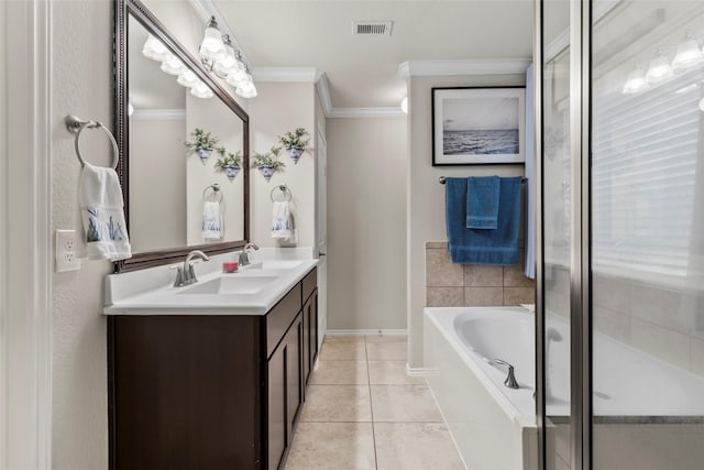 full bath featuring visible vents, a garden tub, crown molding, tile patterned flooring, and double vanity