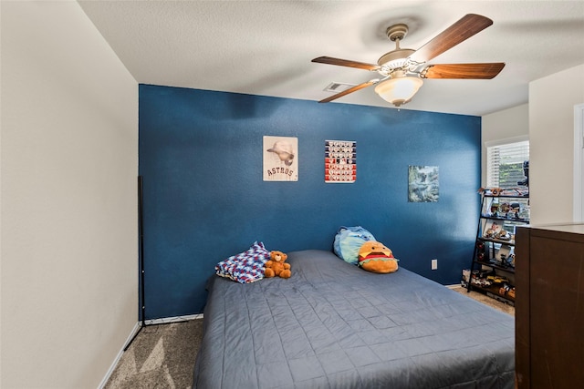 bedroom featuring visible vents, ceiling fan, baseboards, and carpet