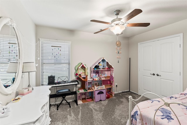 carpeted bedroom featuring a closet and a ceiling fan