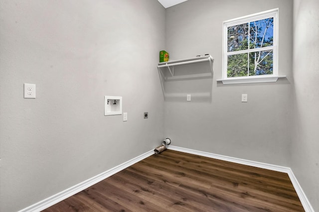 laundry room featuring dark wood-style floors, baseboards, hookup for an electric dryer, hookup for a washing machine, and laundry area