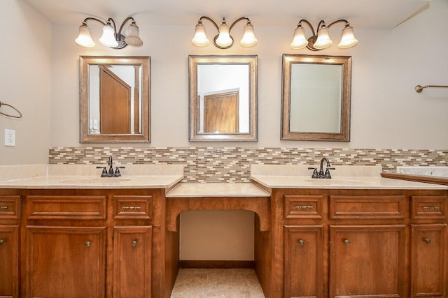 full bathroom featuring decorative backsplash, double vanity, tile patterned floors, and a sink