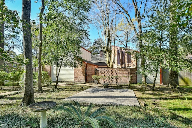 exterior space with brick siding