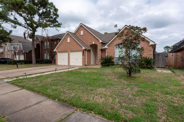 ranch-style home with brick siding, driveway, an attached garage, and a front yard