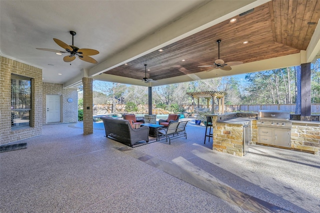 view of patio with area for grilling, outdoor dining area, a ceiling fan, and fence