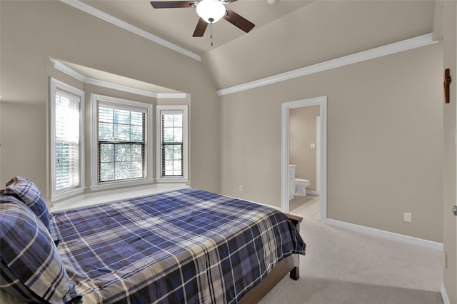 bedroom featuring connected bathroom, baseboards, ornamental molding, carpet flooring, and a ceiling fan