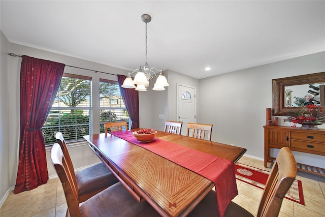 dining room with light tile patterned floors, baseboards, an inviting chandelier, and recessed lighting