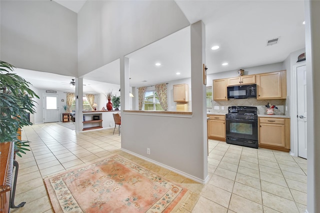 kitchen featuring black appliances, light tile patterned flooring, visible vents, and light brown cabinetry