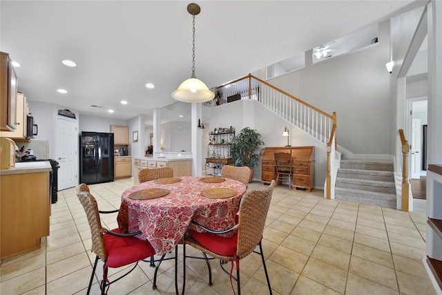 dining space with stairs, light tile patterned floors, recessed lighting, and baseboards