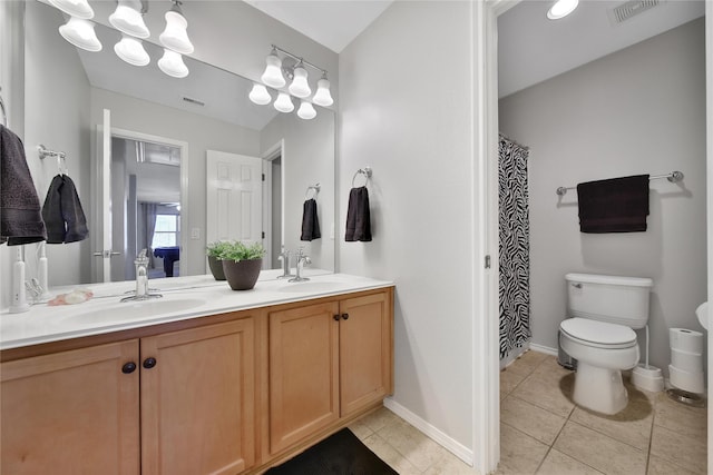 full bath with double vanity, visible vents, and a sink