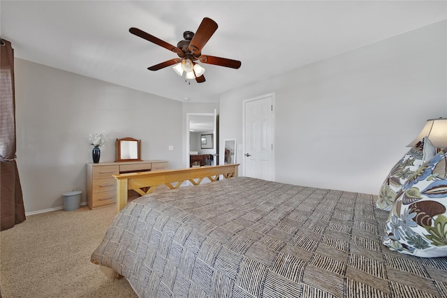 bedroom with light carpet, baseboards, and ceiling fan