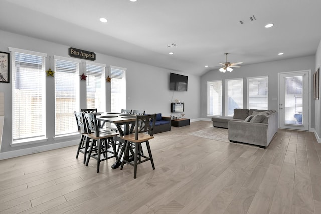 dining room with light wood finished floors, visible vents, plenty of natural light, and recessed lighting