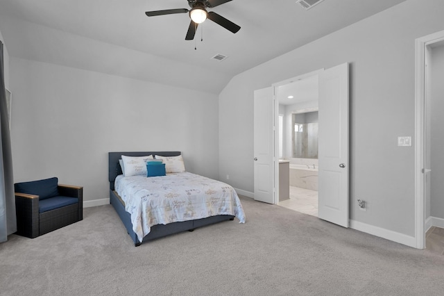 bedroom featuring vaulted ceiling, carpet flooring, baseboards, and visible vents