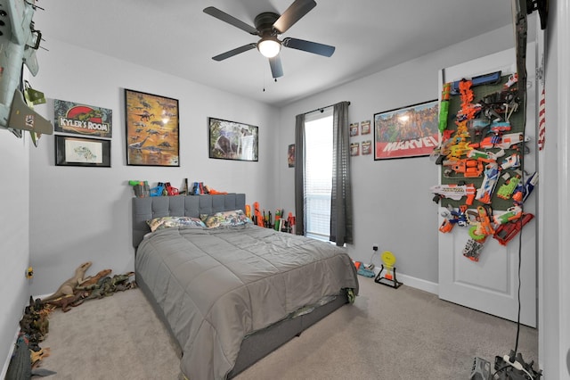 bedroom featuring a ceiling fan, baseboards, and carpet floors