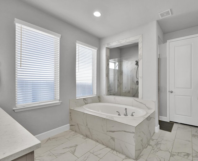 full bath featuring a marble finish shower, baseboards, visible vents, and marble finish floor