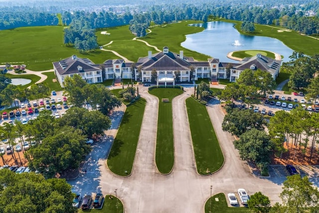 birds eye view of property featuring a water view and golf course view