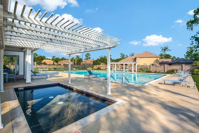 pool featuring a patio, a pergola, and fence