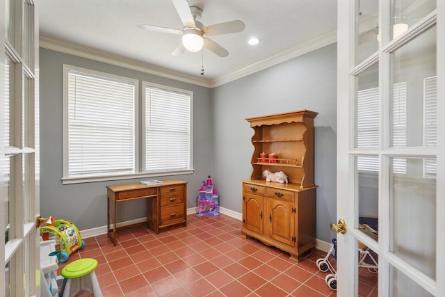 interior space featuring light tile patterned floors, a ceiling fan, crown molding, and baseboards