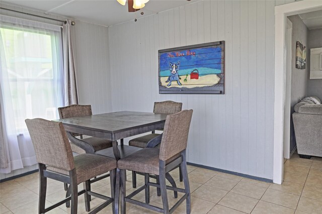 419 Murex St, Surfside Beach, TX 77541 - dining area with light tile patterned floors and baseboards