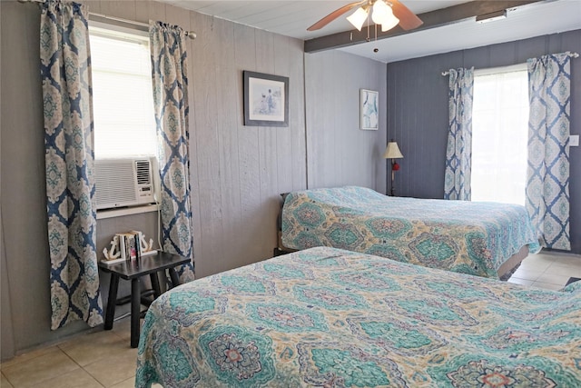 419 Murex St, Surfside Beach, TX 77541 - tiled bedroom with beamed ceiling, cooling unit, a ceiling fan, and wood walls