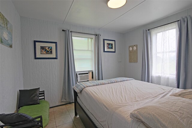 419 Murex St, Surfside Beach, TX 77541 - bedroom featuring light tile patterned floors and cooling unit