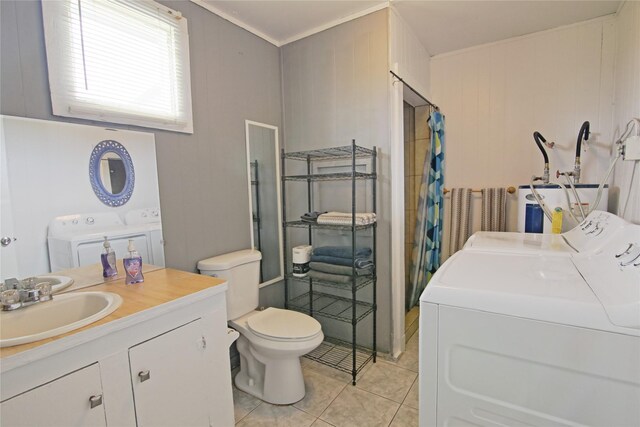 419 Murex St, Surfside Beach, TX 77541 - bathroom featuring tile patterned flooring, toilet, water heater, washer and dryer, and vanity