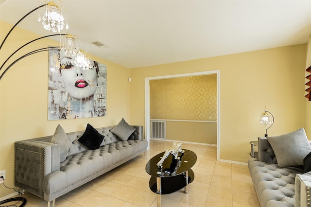 living area featuring wallpapered walls, tile patterned floors, baseboards, and visible vents