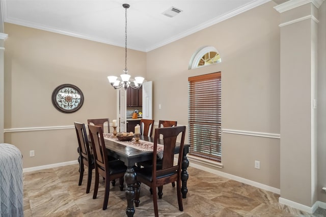 dining room featuring visible vents, an inviting chandelier, crown molding, and baseboards